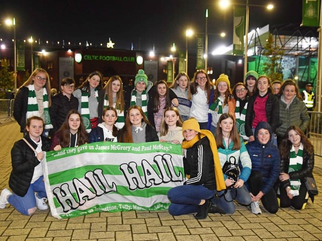 A group of Celtic fans turn up with flag in tow