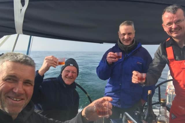 Martin Wishart (left) will be joined on the boat by four other people as they take on the four-week challenge. Picture: PA