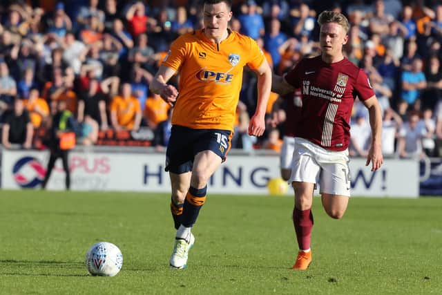 George Edmundson, left, in action for former club Oldham Athletic. Picture: Pete Norton/Getty Images