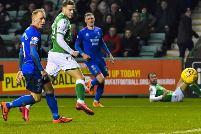 Young striker Jamie Gullan scores his first goal for the Hibs top team. Picture: Rob Casey / SNS